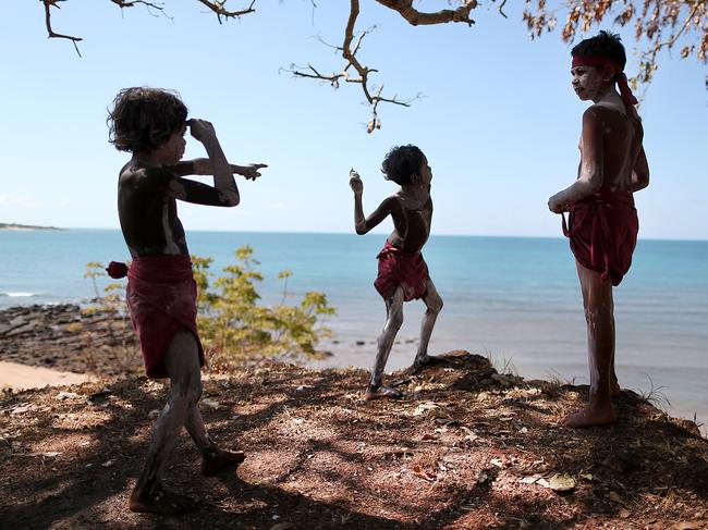 NEWS_People from the Rirratjingu Tribe in Yirrkala in East Arnhem Land in Northern Territory prepare themselves for a welcome to country for the australian PM this afternoon Sunday September 14th, 2014. Pictures: Jack Tran / The Courier Mail