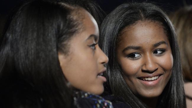 Obama’s youngest daughter Sasha (right), 15, was no where to be seen at her father’s final public address as President of the United States. She’s pictured here with her older sister Malia, 18, who did attend. Picture: Olivier Douliery- Pool/Getty Images                        <a capiid="97eef4ad0f53a2212bae5f25d9a92ca8" class="capi-video">Obama thanks family and 'scrappy kid from Scranton'</a>