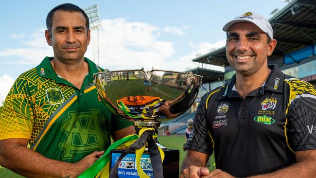 St Mary's and Nightcliff coaches Anthony Vallejo and Chris get a close-up view of the 2019-2020 NTFL premiership cup. Picture: Che Chorley