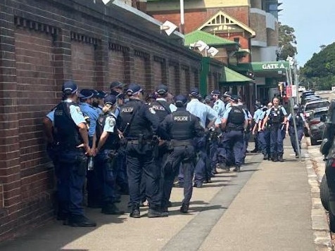 Police gather outside the SCG on Driver Ave Moore Park.