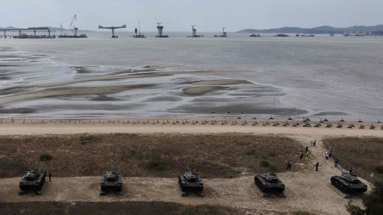 This October 2020 photo shows anti-landing spikes and retired tanks along the coast of Taiwan’s Kinmen islands, just 3.2km from the mainland China coast in the Taiwan Strait. Picture: Sam Yeh/AFP