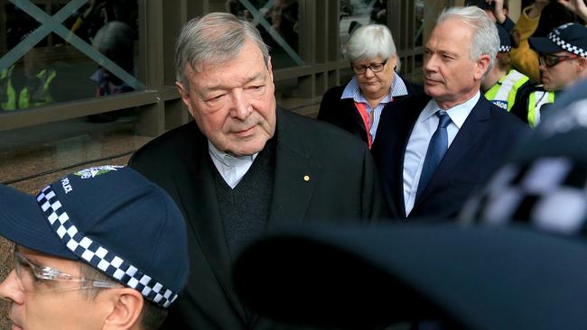 Cardinal George Pell leaves court after a hearing earlier this year. Picture: Mark Stewart