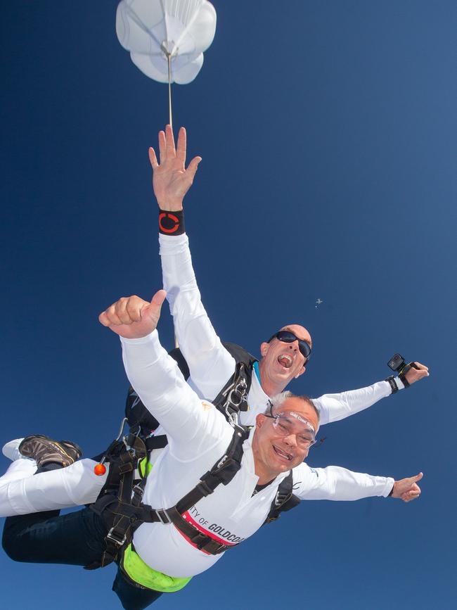 Gold Coast Skydive owner Archie Jamieson taking Mayor Tom Tate of a free fall to launch the World Parachute Championships.