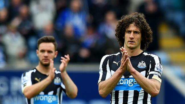 LEICESTER, ENGLAND - MAY 02: Adam Armstrong (L) and Fabricio Coloccini of Newcastle United look dejected after the Barclays Premier League match between Leicester City and Newcastle United at The King Power Stadium on May 2, 2015 in Leicester, England. (Photo by Michael Regan/Getty Images)