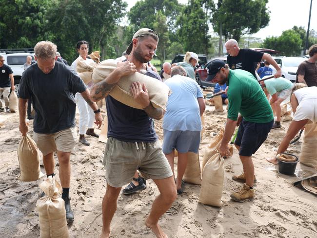 Byron residents are prepare and filling sandbags at Butler Street Reserve, Byron Bay. Picture: Rohan Kelly