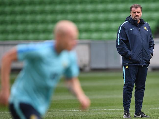 Ange Postecoglou watches Aaron Mooy train during his time at Socceroos coach. Picture: AAP Image/Julian Smith