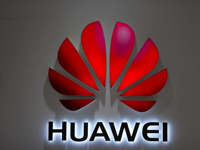 FILE - In this July 4, 2018, file photo, the Huawei logo is seen at a Huawei store at a shopping mall in Beijing. Canadian authorities said Wednesday, Dec. 5, 2018,  that they have arrested the chief financial officer of China's Huawei Technologies for possible extradition to the United States. Justice Department spokesman Ian McLeod said Meng Wanzhou was detained in Vancouver, British Columbia, on Saturday, Dec. 2.(AP Photo/Mark Schiefelbein, File)