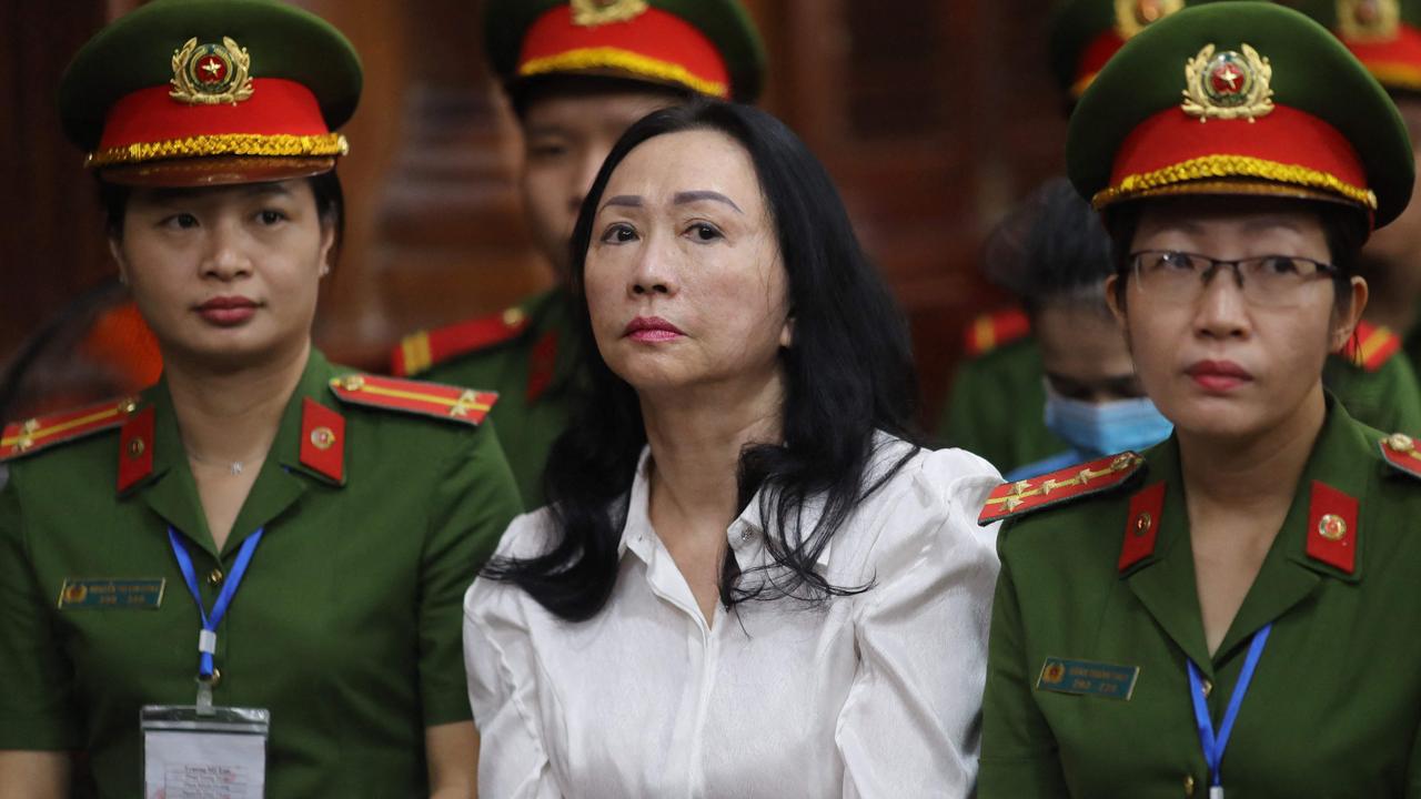 Vietnamese property tycoon Truong My Lan (C) looks on at a court in Ho Chi Minh City on April 11, 2024. A top Vietnamese property tycoon could face the death penalty when she and dozens of other co-accused face verdicts on April 11 in one of the country's biggest fraud cases over the embezzlement of USD 12.5 billion. (Photo by AFP)