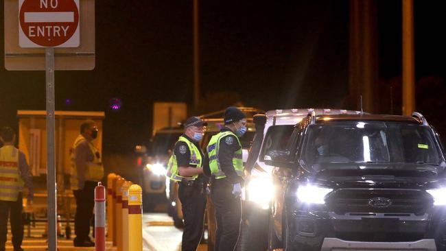 Traffic crossing the border at Midnight when the borders to South Australia opened to NSW and Victoria. Picture Dean Martin