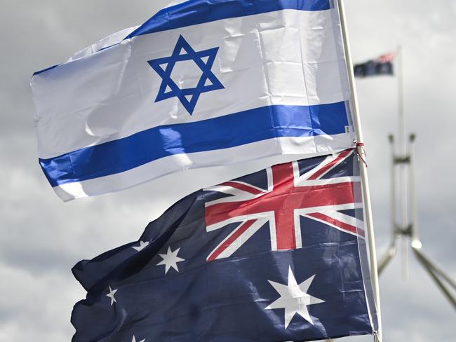 CANBERRA, Australia - NewsWire Photos - October 7, 2024: Thousands of attendees gather at Parliament House in Canberra taking an historic stand against antisemitism and to stand in support of Israel.  Picture: NewsWire / Martin Ollman