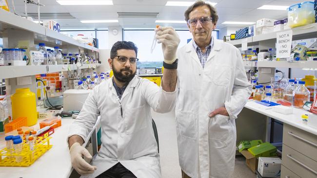 Dr Harry Al-Wassiti, left, with Professor Colin Pouton at Monash University's Institute of Pharmaceutical Sciences where they are making an mRNA vaccine. Picture: Aaron Francis