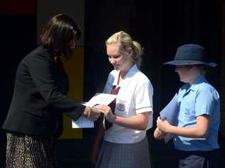 St Josephs primary school. Lisa and Merrick Chapman getting medals from Justine Elliot. Photo: John Gass / Daily News. Picture: John Gass