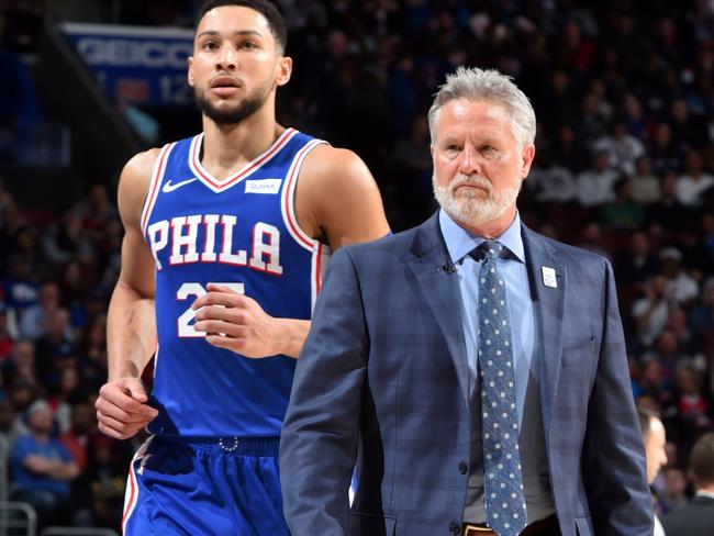 PHILADELPHIA, PA - MARCH 20: Ben Simmons #25 and Brett Brown of the Philadelphia 76ers look on during a game against the Boston Celtics on March 20, 2019 at the Wells Fargo Center in Philadelphia, Pennsylvania NOTE TO USER: User expressly acknowledges and agrees that, by downloading and/or using this Photograph, user is consenting to the terms and conditions of the Getty Images License Agreement. Mandatory Copyright Notice: Copyright 2019 NBAE (Photo by Jesse D. Garrabrant/NBAE via Getty Images)