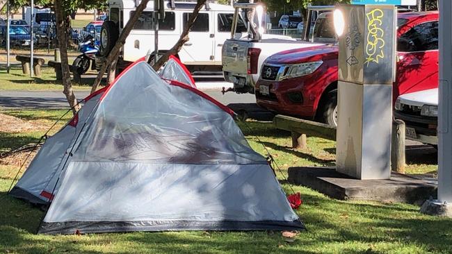 A tent in Carey Park at Southport near a parking station.