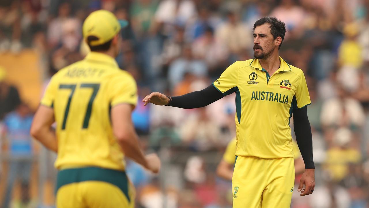 Mitchell Starc of Australia celebrates the wicket of Hashmatullah Shahidi of Afghanistan during the ICC Men's Cricket World Cup India 2023 between Australia and Afghanistan at Wankhede Stadium on November 07, 2023 in Mumbai, India. (Photo by Robert Cianflone/Getty Images)