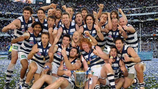 The Cats celebrate after the 2009 premiership win.