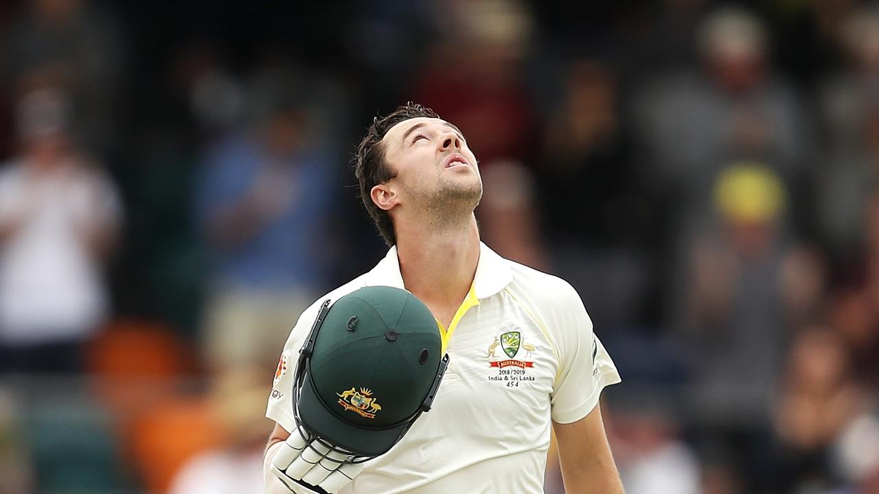 Travis Head shares his century celebration with Phillip Hughes. 