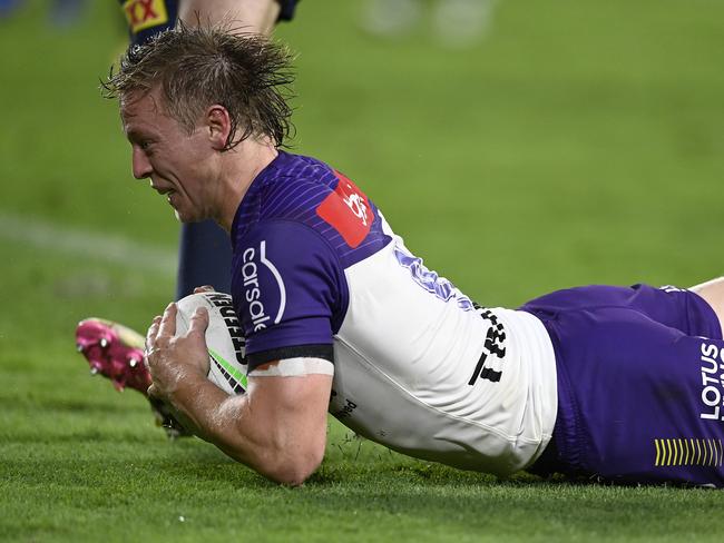 TOWNSVILLE, AUSTRALIA - AUGUST 29: Tyran Wishart of the Storm scores a try during the round 26 NRL match between North Queensland Cowboys and Melbourne Storm at Qld Country Bank Stadium, on August 29, 2024, in Townsville, Australia. (Photo by Ian Hitchcock/Getty Images)