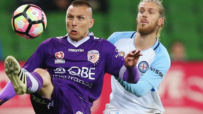 Luke Brattan (right) in action during Melbourne City’s loss to Perth at AAMI Park on Friday night. The midfielder wasn’t happy with his side’s sub-par display. Picture: Getty Images