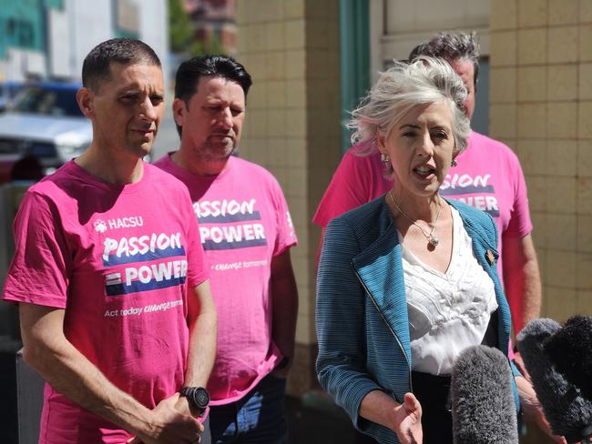 Greens leader Rosalie Woodruff with health union delegates in Hobart on Thursday, February 15, 2024.