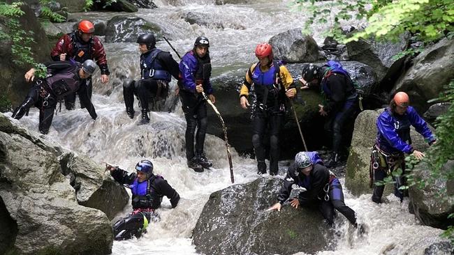 Rescue workers search for bodies in Saxetenbach Gorge after the 1999 canyoning disaster.