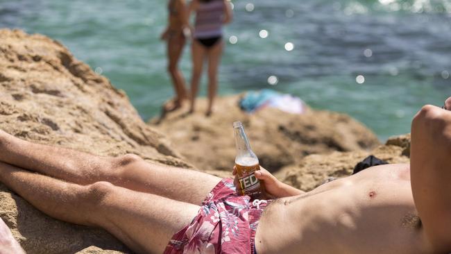 A man has a beer at The Pillars. Picture: Daniel Pockett