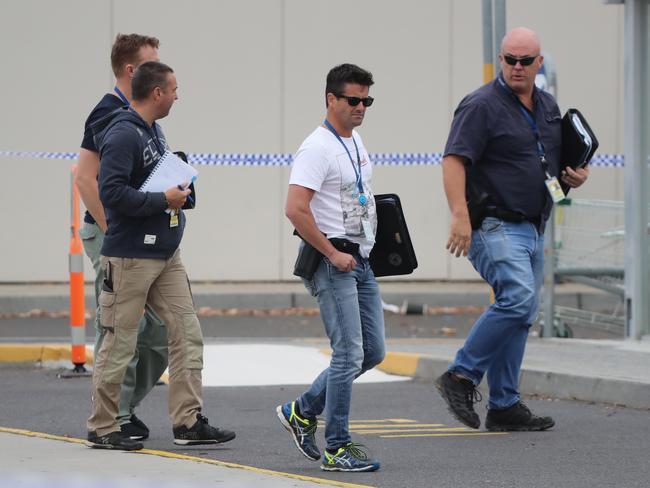 Police investigate the armed robbery. Picture: Alex Coppel.