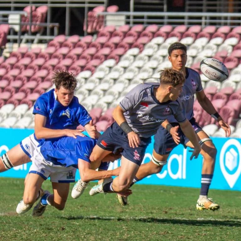 Malakaih Beals gets the ball away during the 2024 Emerging Reds Cup at Ballymore.