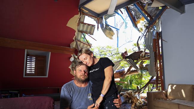 Luci Simmons and Michael Meudell at their Helensvale home which was left uninhabitable aby the Christmas Day storm. Pics Adam Head