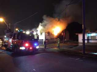 Seven fire crews battle a large house fire at Archer Street in the early hours of Friday morning. PHOTO: WIN News Central Queensland