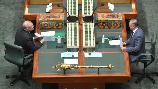 Prime Minister Scott Morrison and Leader of the Opposition Anthony Albanese during a parliamentary sitting under rules of social distancing in the House of Representatives at Parliament House in Canberra on Wednesday.