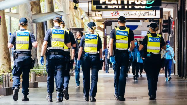 Police patrol the streets of Melbourne at the start of a 'circuit breaker' lockdown imposed suddenly by the Victorian government.