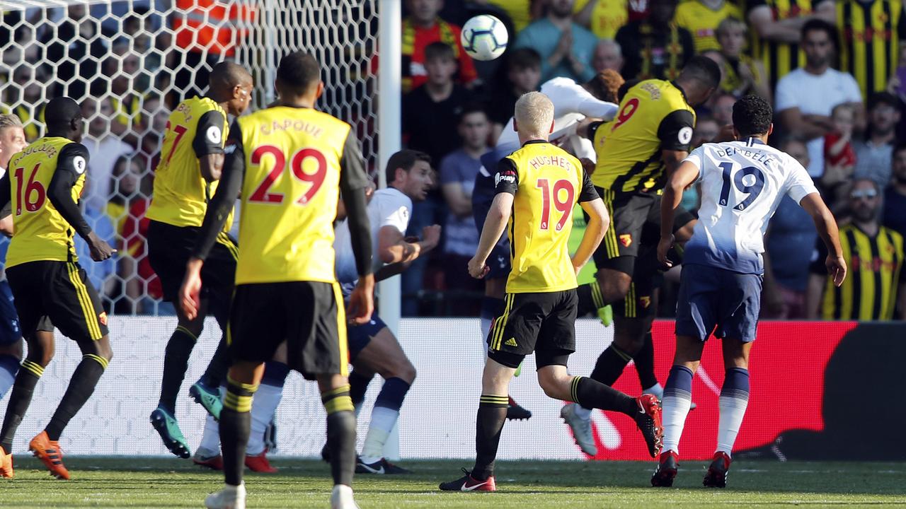 Watford's Troy Deeney, 2nd right, scores his side's first goal during the English Premier League soccer match between Watford FC and Tottenham Hotspur. Picture: AP Photo