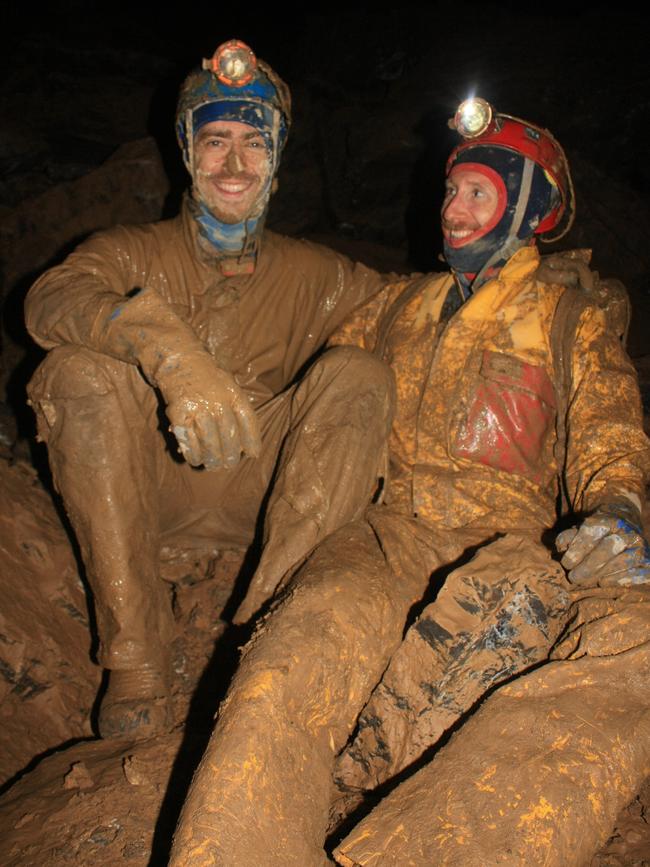 Cavers covered in mid after their expedition. Picture: Stefan Eberhard