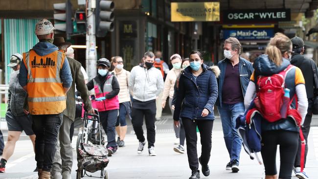 People start to return to the CBD on Wednesday as restrictions are eased. Picture: NCA NewsWire/ David Crosling