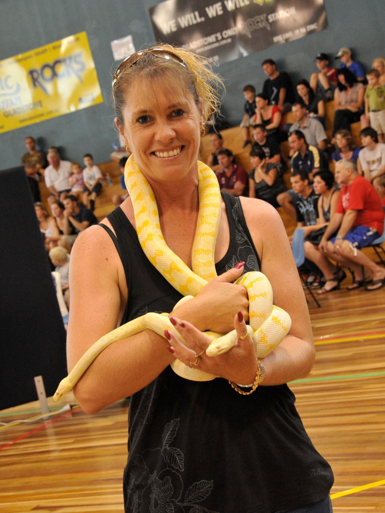 Cheryl Wilson with Albino carpet snake on show at the Gladstone PCYC Reptile Expo. 