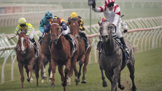 Kerrin McEvoy salutes on Classique Legend as he crossed the line in The Everest. Photo: Mark Evans/Getty Images