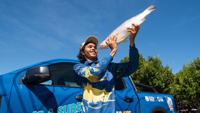 Keegan Payne with his million dollar barra. Picture: Pema Tamang Pakhrin