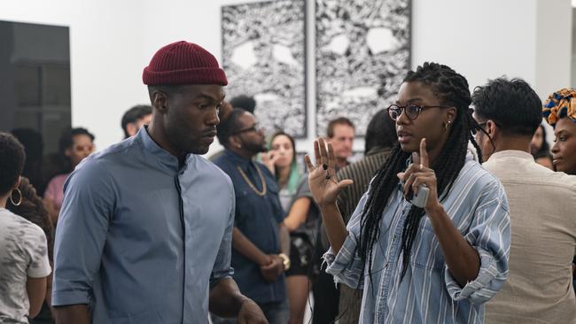 Yahya Abdul-Mateen II and director Nia DaCosta on the set of Candyman.