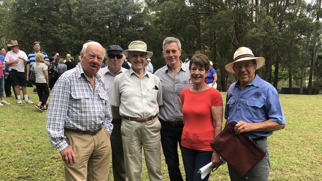 James Colman, John Peterson, Robert Crowe, John Matheson, Penny Cockbill and John Cockbill stand together, opposing the 85-unit seniors living development proposal for the Bayview Golf Club.