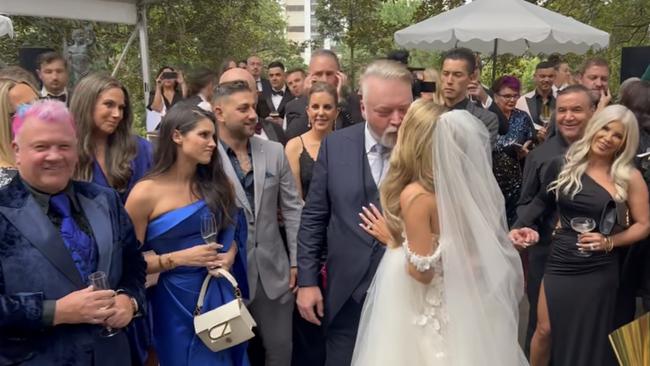 Guests watch on as newlyweds Kyle Sandilands and Tegan Kynaston celebrate their marriage. Picture: News Corp - Exclusive