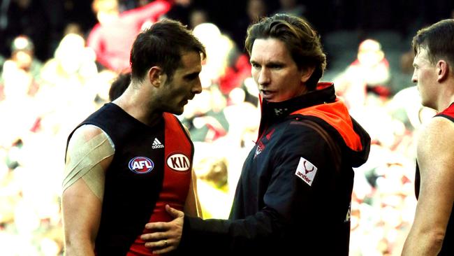 James Hird talks with Jobe Watson during his time as Essendon coach.