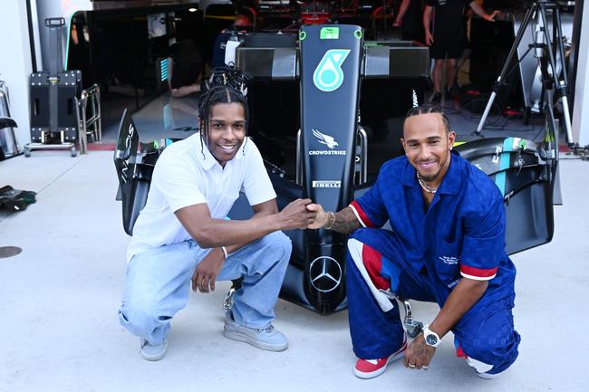 Lewis Hamilton of Great Britain and Mercedes poses with A$AP Rocky in the Paddock ahead of the Miami Grand Prix.