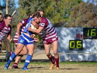 TOUGH GAME: Al Lobb and Jack Rowbotham go hard up against each other. Picture: Molly Hancock