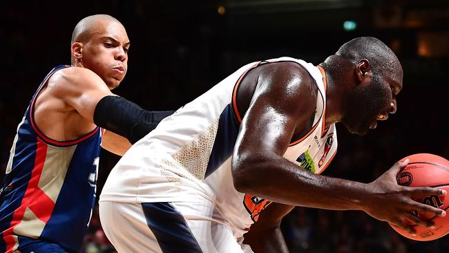 ADELAIDE, AUSTRALIA — NOVEMBER 23: Nate Jawai of the Taipans under pressure from Jacob Wiley of the Adelaide 36ers during the round seven NBL match between the Adelaide 36ers and the Cairns Taipans at Titanium Security Arena on November 23, 2018 in Adelaide, Australia. (Photo by Mark Brake/Getty Images)