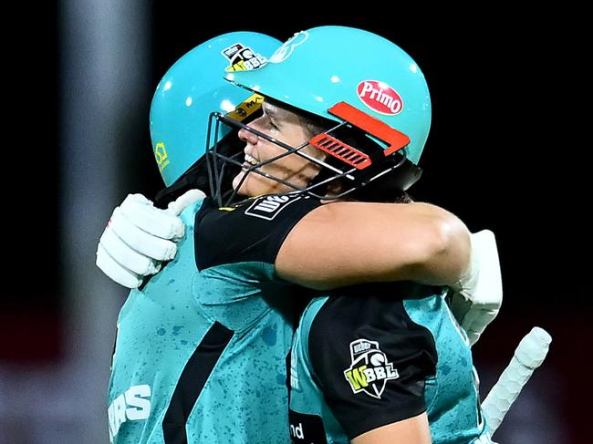 BRISBANE, AUSTRALIA - NOVEMBER 24: Laura Harris and Jessica Jonassen of the Heat celebrate victory during the WBBL match between Brisbane Heat and Sydney Sixers at Allan Border Field on November 24, 2024, in Brisbane, Australia. (Photo by Albert Perez/Getty Images)