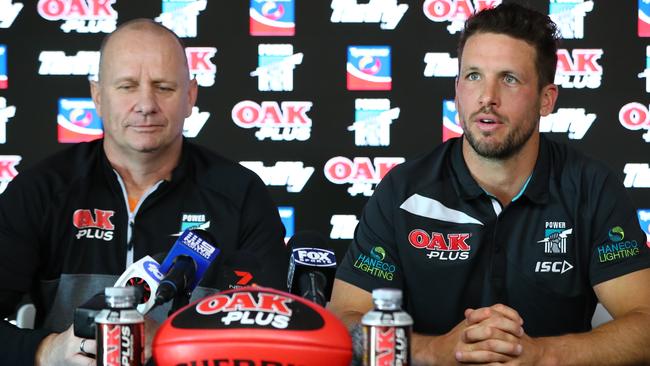 Port Adelaide coach Ken Hinkley listens as Travis Boak announces he has stepped down as captain of Port Adelaide. Picture: Tait Schmaal