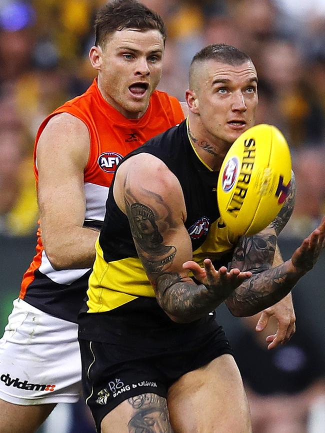 Richmond's Dustin Martin marks the GWS Giants’ Heath Shaw. Picture: Michael Klein