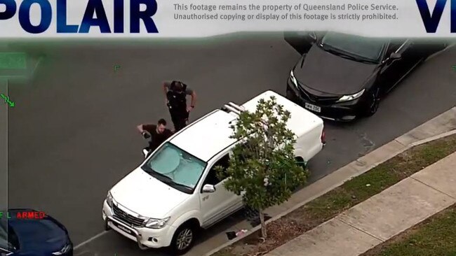 Polair footage of a police officer attempting to smash into an alleged stolen vehicle. Photo: Queensland Police