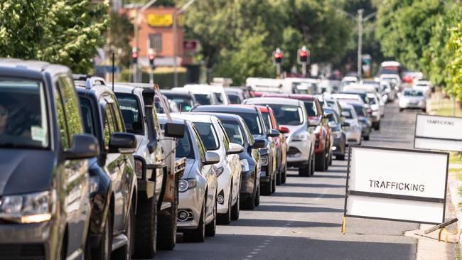 Cars queuing up to get through to Wodonga from Albury. Picture: Simon Dallinger